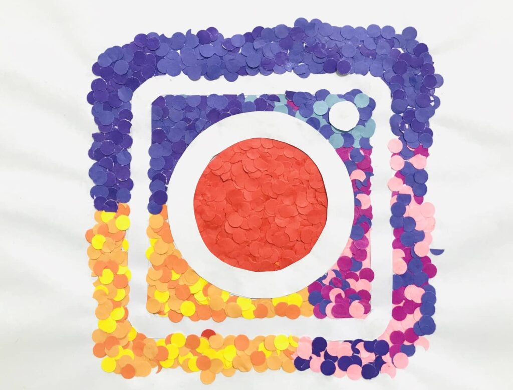 Instagram logo created out of flowers.